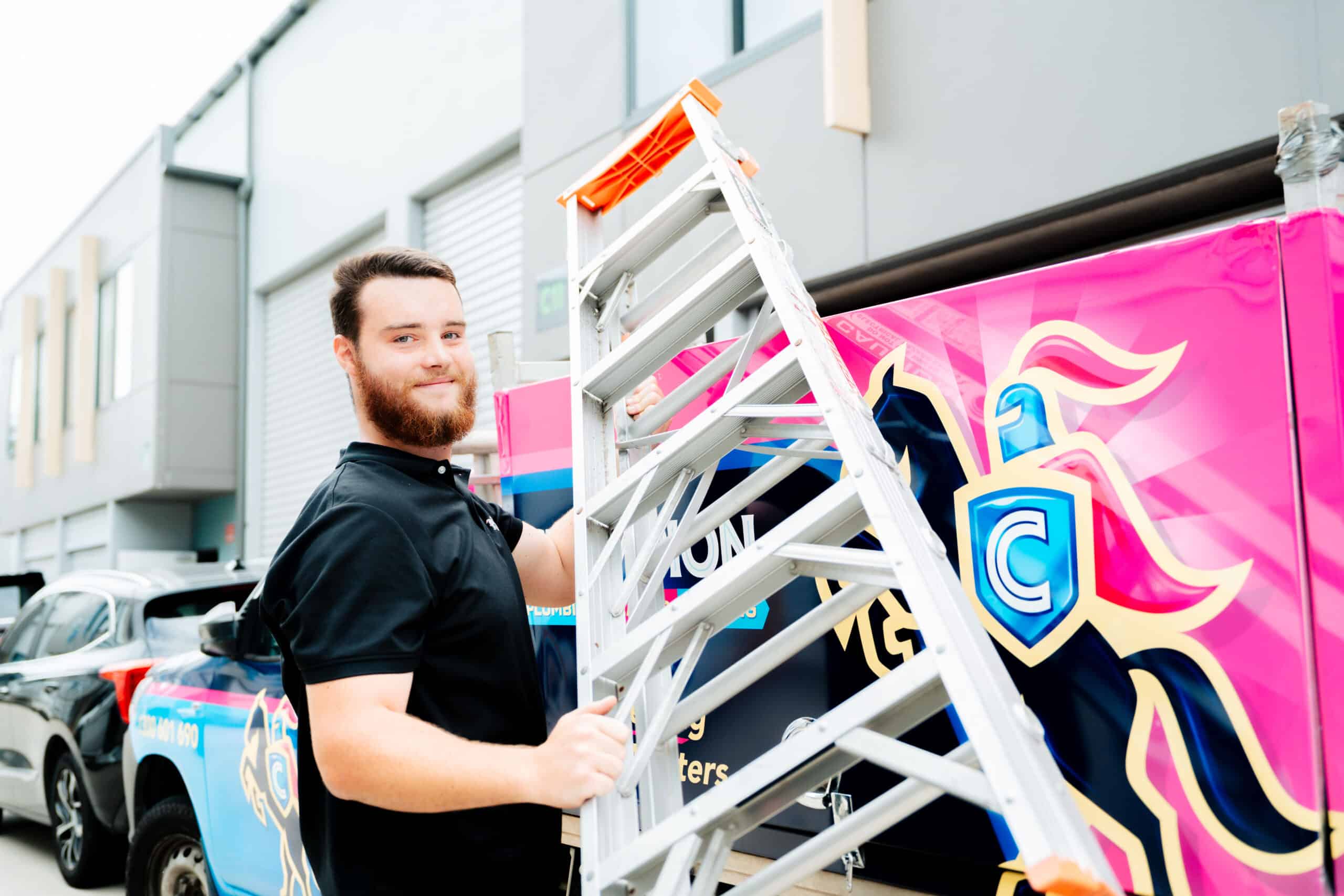 Plumber using drain inspection equipment at job site