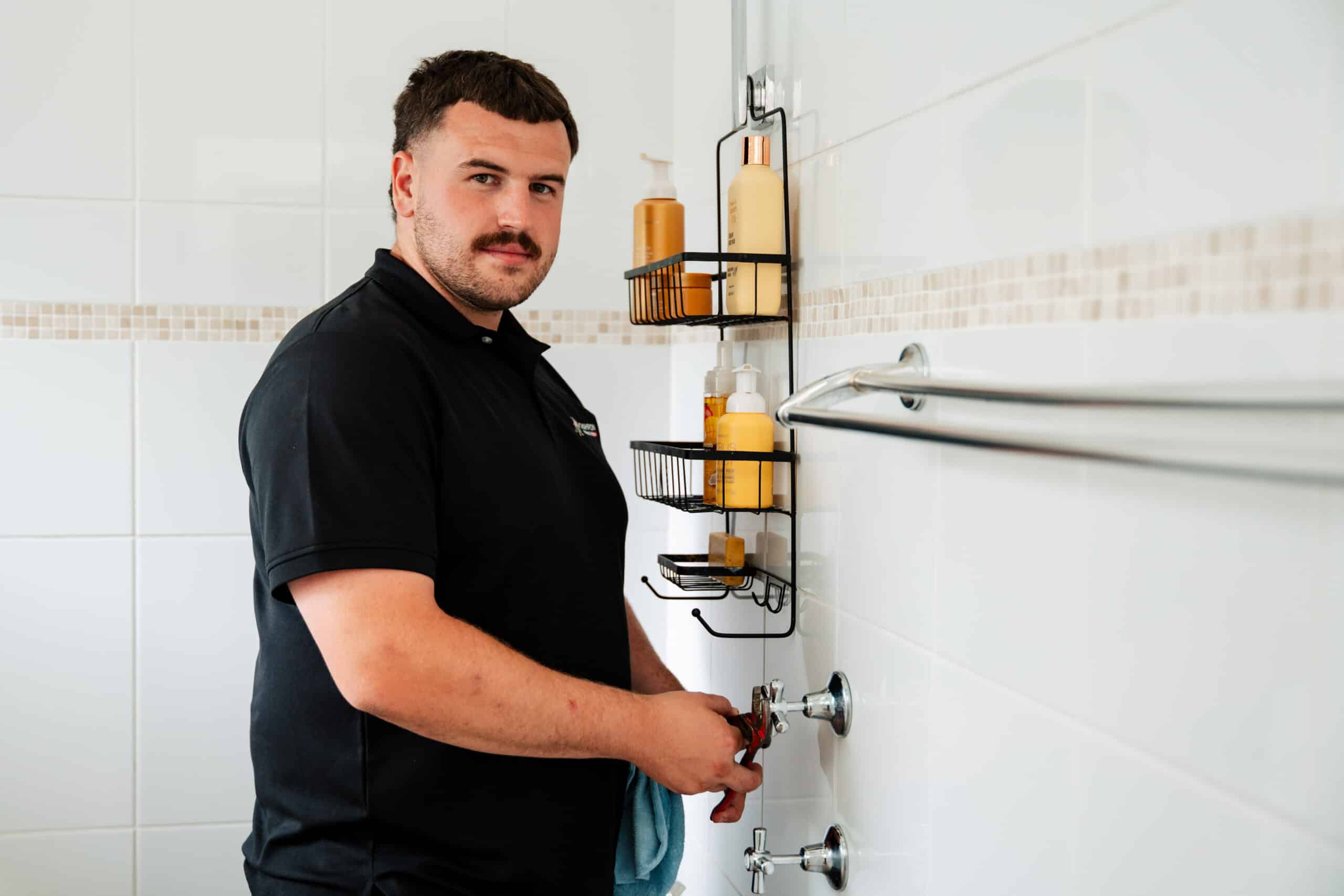 Team of plumbers at residential job site