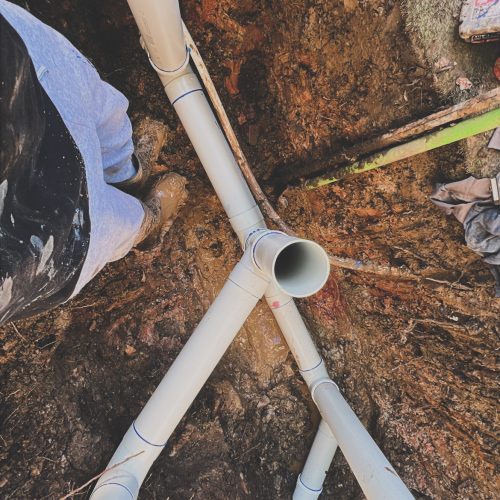 Faulty section of sewer pipe replaced with new PVC pipework and junction in North Strathfield